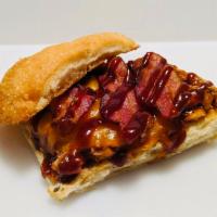 Cowboy Sandwich · Shredded smoked chicken served on a grilled ciabata bun, topped with cheddar cheese, applewo...