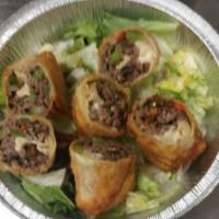 House made Philly Steak Egg Rolls · Egg Rolls with philly steak and a orange mandarin dipping sauce