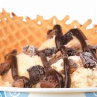 Peanut Butter Bonds · Flavor: peanut butter mixins: Reese's peanut butter cups and brownies topping: fudge comes w...