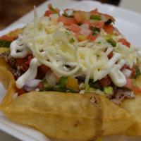 Taco Bowl · Served in a fried tortilla bowl with chicken, rice, black bean, corn pico de gallo, cheese a...