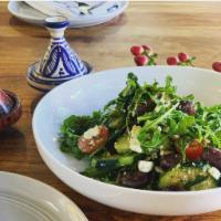 Mediterranean Salad · Arugula, cucumbers, olives, tomatoes, feta cheese and house dressing.