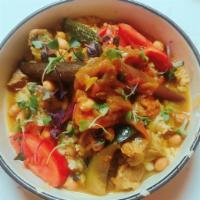 Berber Couscous · Lamb, carrots, zucchini, butternut squash, garbanzo beans, onions, raisins