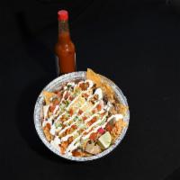 Pollo Burrito Bowl · Chicken served over corn chips choice of cheese,lettuce,pico,cilantro,onions,corn,salsa and ...