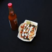 Carnitas (pork) Taco · Served on a soft flour tortilla with choice of cheese,lettes,pico,cilantro,onions,corn,salsa...