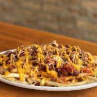Chili Cheese Fries · Seven-Pepper Chili, Cheddar cheese sauce, Cheddar Jack, side of sour cream