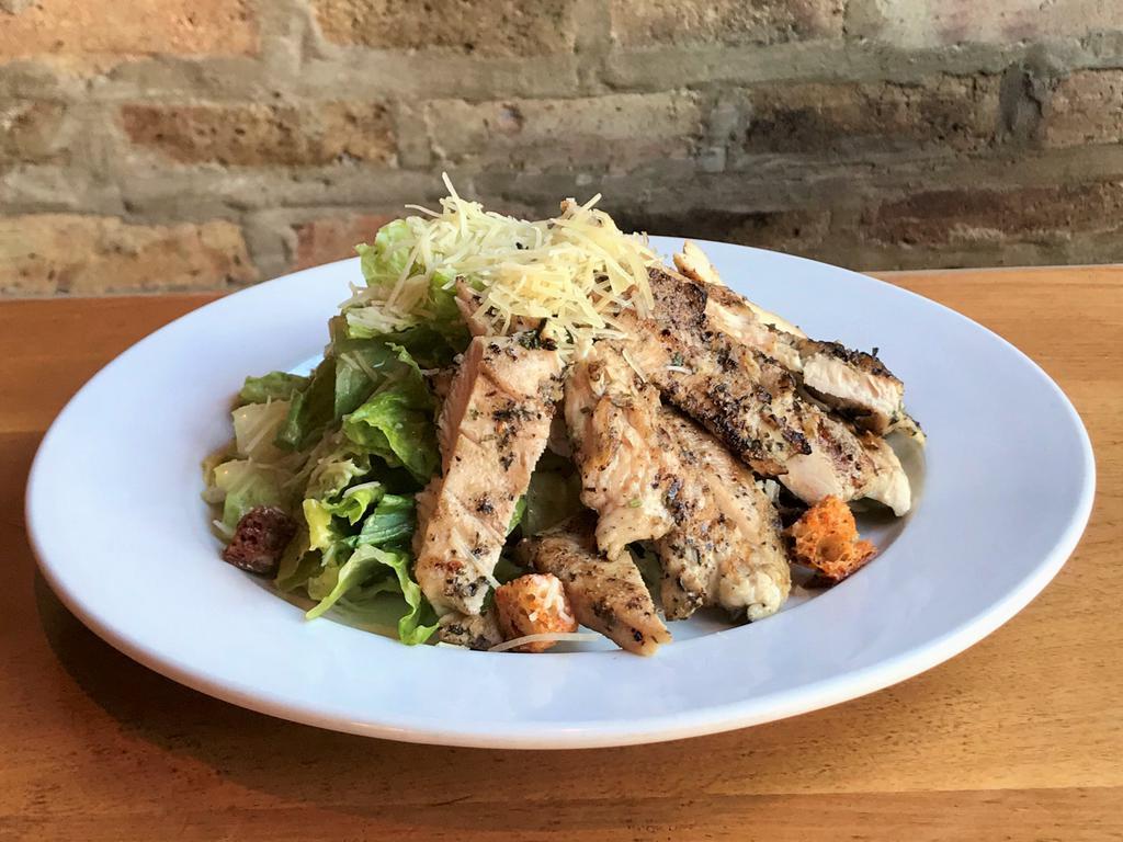 Caesar Salad · Romaine, croutons, Parmesan cheese, and Caesar dressing. Add grilled chicken for an additional charge.