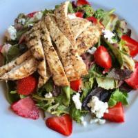 Mac's Chicken Salad · Grilled marinated chicken breast, leafy greens, strawberries, goat cheese, spiced walnuts, a...