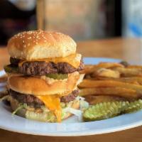 Daddy Mac's Burger · Two wood-grilled, USDA Prime Certified Angus Beef® burgers (8 oz. each), housemade secret sa...