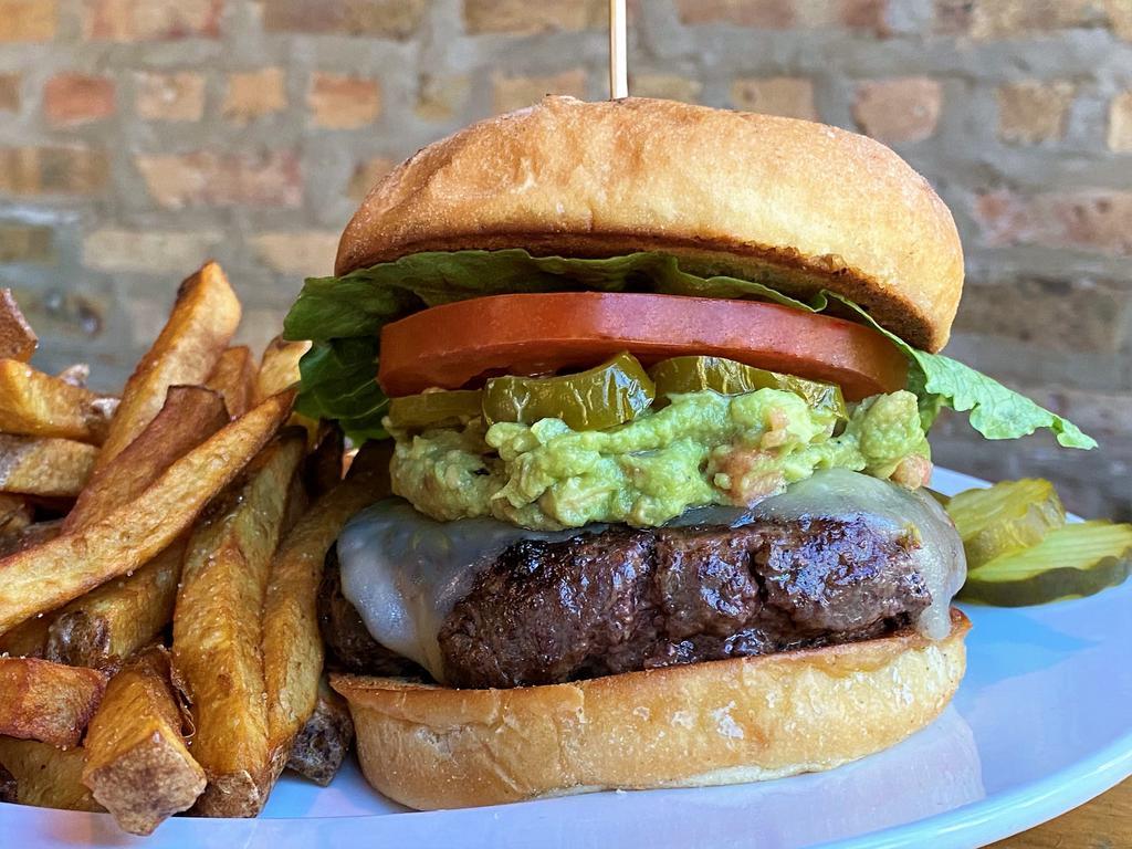 3. The Guac Burger · Guacamole, Pepper Jack cheese, pickled jalapenos, lettuce, tomato, dill pickles. USDA Prime Certified Angus Beef®  (8 oz. burger).  Served with fries.