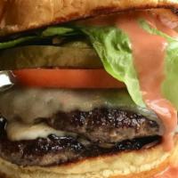 12. Double Smash Griddle Burger · Double smash (two 8 oz. patties) with Swiss, pepper jack, and secret sauce. USDA Prime Certi...