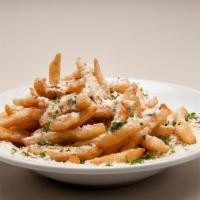 Italian Fries · Topped with oregano, basil, olive oil, chili flakes, garlic and Parmesan cheese. 