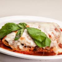Lasagna Rolendine Entree · Served with marinara sauce, a roll and Parmesan cheese. 
