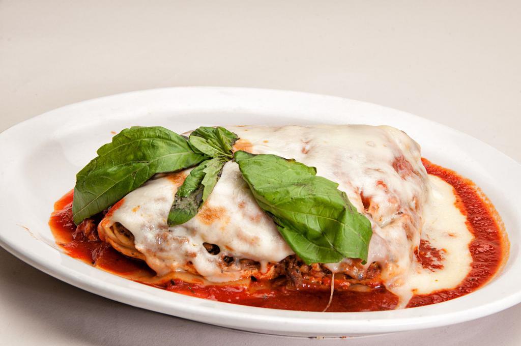 Lasagna Rolendine Entree · Served with marinara sauce, a roll and Parmesan cheese. 