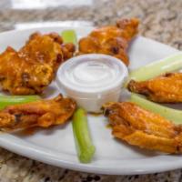 10 Pieces Buffalo Wings · Chicken wings fried then tossed in sauce. Add-ons for an additional charge.