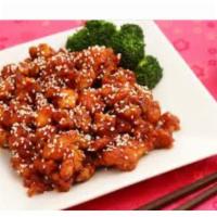 Sesame Chicken · Chunks of chicken prepared with sweet coating with sesame. Served with steamed rice.