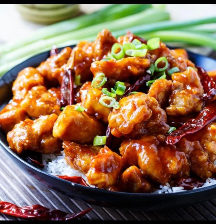 General Tso's Chicken · Chunks of chicken and dried red pepper in ginger and garlic sauce. Served with steamed rice. Spicy.
