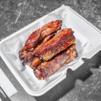 Beef Rib Dinner · Seasoned and slow-smoked with sides.