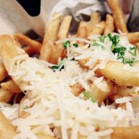 Greek Fries · Fries with Parmesan cheese, parsley, salt, and pepper.