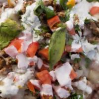 Danny's Mexican Nachos · Tortilla chips, Jack cheese, pinto beans, pico de gallo, avocado, sour cream the meat of you...