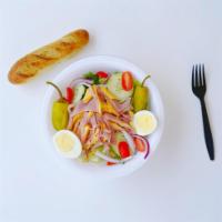 Julienne Salad · Freshly sliced Krakus ham and American cheese on top of our garden salad. Served with bread. 