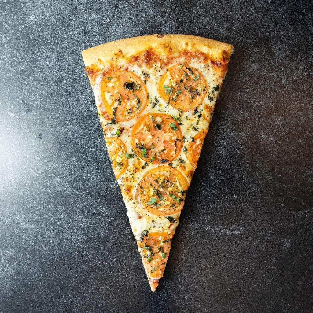 Margherita Jumbo Slice · Topped with fresh basil and tomato slices, our Margherita Pizza will have you in pizza heaven.