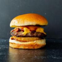 Roadhouse Steak Burger · A 6 oz. juicy steak burger topped with smoked bacon, American cheese, honey BBQ and a jumbo ...