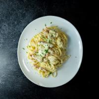 Linguine Chicken Alfredo · Linguine pasta sauteed in our impeccable blend of cream and Parmesan cheese, then tossed wit...