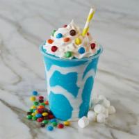 Cotton Candy Shake · Cotton candy ice cream topped with whipped cream and m&m, with marshmallow topping drizzle o...