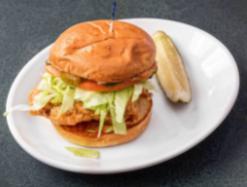 Spicy Chicken Sandwich · Fried Chicken Breast, Lettuce, Tomato, Sliced Pickles and Chipotle Mayo. Served with Fries.