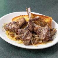 Lamb Chops  · Served with Grilled Onions, Sauteed Mushrooms, Mashed Potatoes and Garlic Toast