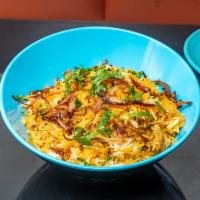 Chicken Biryani · Layers of aromatic basmati rice and spice.