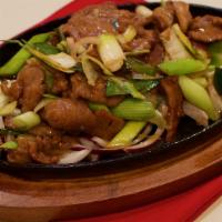 Sizzling Lamb Fillet with Scallion 京葱爆羊片 · 