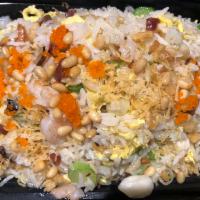 Eight Delights Fried Rice 八宝炒饭 · prawns, scallops, dry scallops, bbq pork, nuts, egg, crab roe