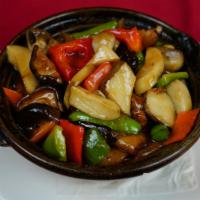 Mushrooms w/ Rice Noodle Rolls in Abalone Sauce 鲍汁杂菇肠粉煲 · 
