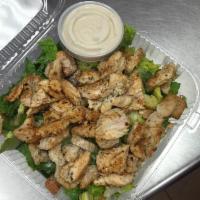 Grilled Chicken Caesar Salad · Green salad with Caesar dressing and cheese. 
