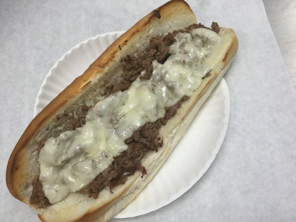 Steak and Cheese Sub · Add onions, peppers, mushrooms for an additional charge.