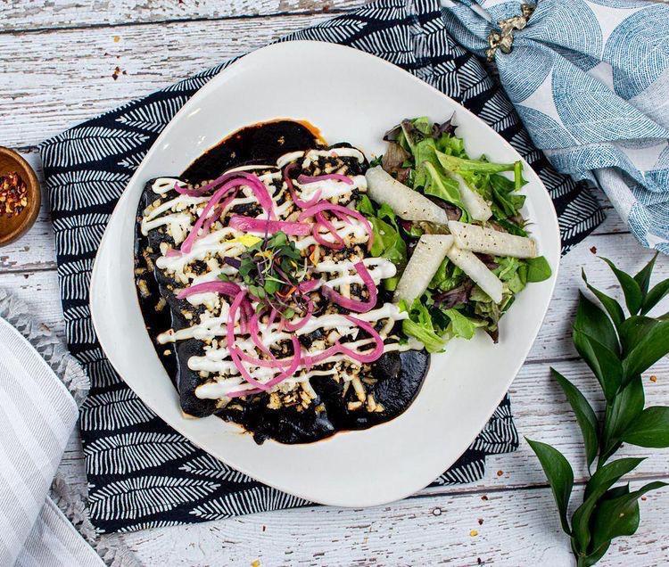  Steak Enchiladas Mole  · 3 enchiladas in mole coloradito or negro with steak, topped with queso fresco, sour cream, and red onion, served with a jicama salad.