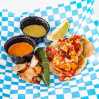 Blackened Shrimp Taco · Blackened shrimp, pico de gallo, and guacamole.