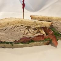 House Roasted Turkey Sandwich · Roasted turkey on your choice of bread with mayo, mustard, lettuce, tomato & red onions.