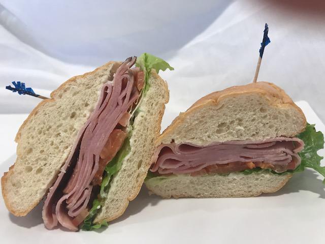 Black Forest Ham Sandwich · Black Forest ham on your choice of bread with mayo, mustard, lettuce, tomato & red onions.
