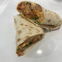 Shawarma Wrap · Beef or chicken marinated in Mediterranean spices, hummus, lettuce, tomatoes, onions, pickle...