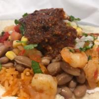 Shrimp Burrito · Tortilla, shrimp, beans, rice, cheese, guacamole, sour cream, corn, pico and salsa.
