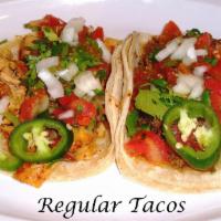 1 Regular Tacos · Corn tortillas, meat, rice, beans, corn, pico and salsa.