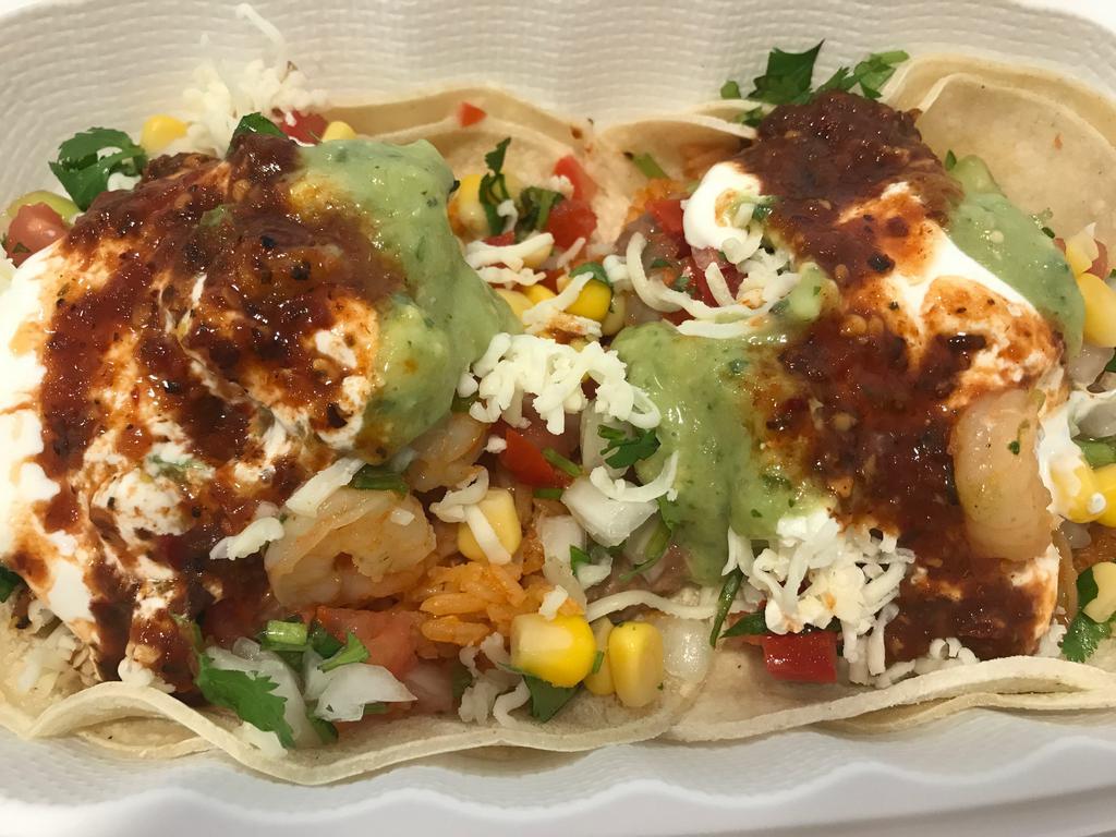 1 Shrimp Tacos · Corn tortillas, shrimp, rice, cheese, sour cream, guacamole, corn, pico and salsa.