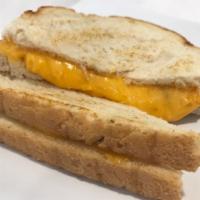 Grilled Cheese Sandwich · Cheddar cheese on sliced sourdough.