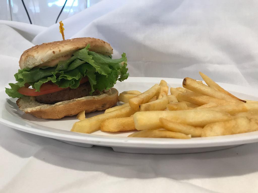 Hamburger · All-natural, charbroiled, 100% Black Angus beef, 80/20 1/3 pound patty comes with, our signature sauce, lettuce, tomato & grilled onions.