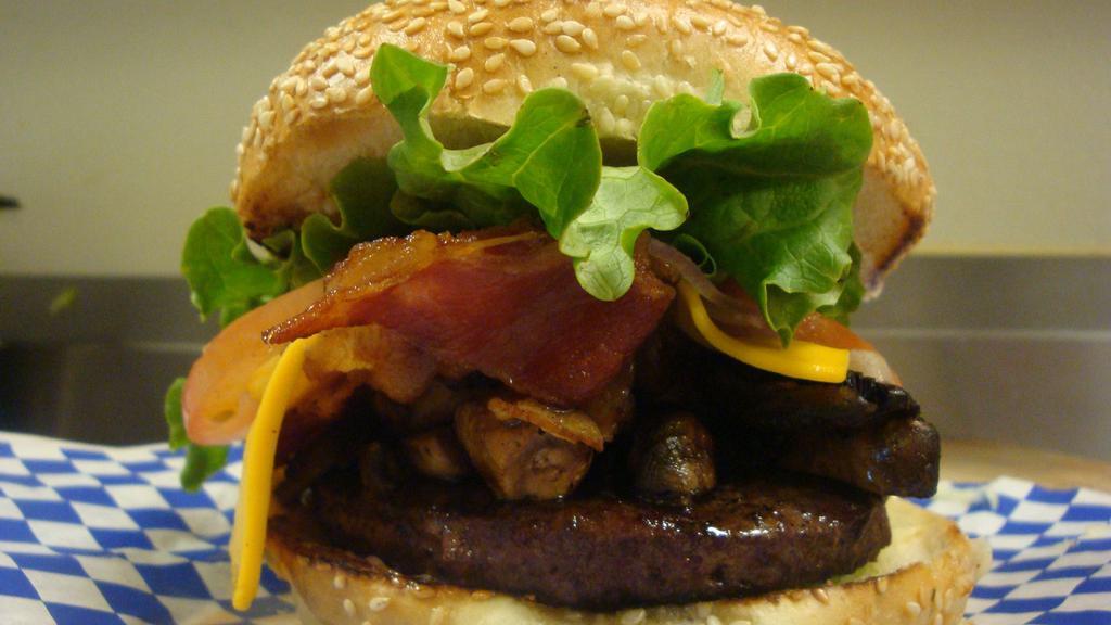 Bam Burger · All-natural, charbroiled, 100% Black Angus beef, 80/20 1/3 pound patty comes with, our signature sauce, smoked bacon, avocado, mushrooms, American cheese, lettuce, tomato & grilled onions.