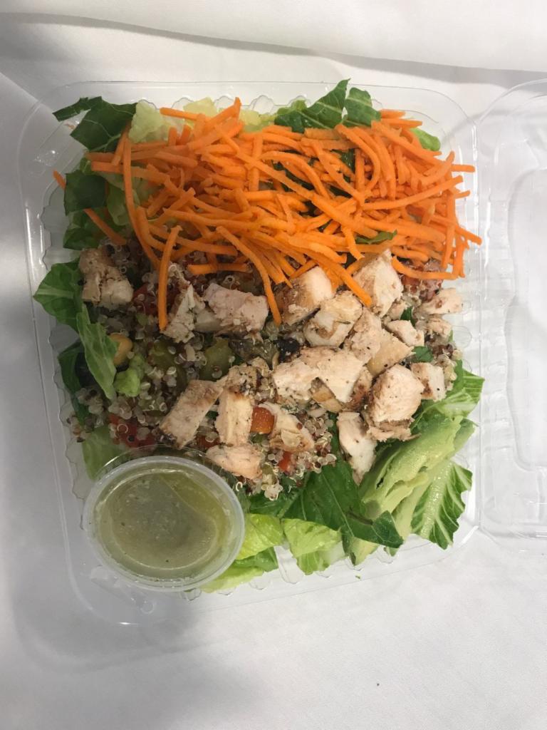 Chicken Quinoa Salad · Romaine hearts, chicken breast, quinoa, parsley, carrots, bell peppers, garbanzo beans, avocado, Mediterranean spices, olive oil and lemon juice. 