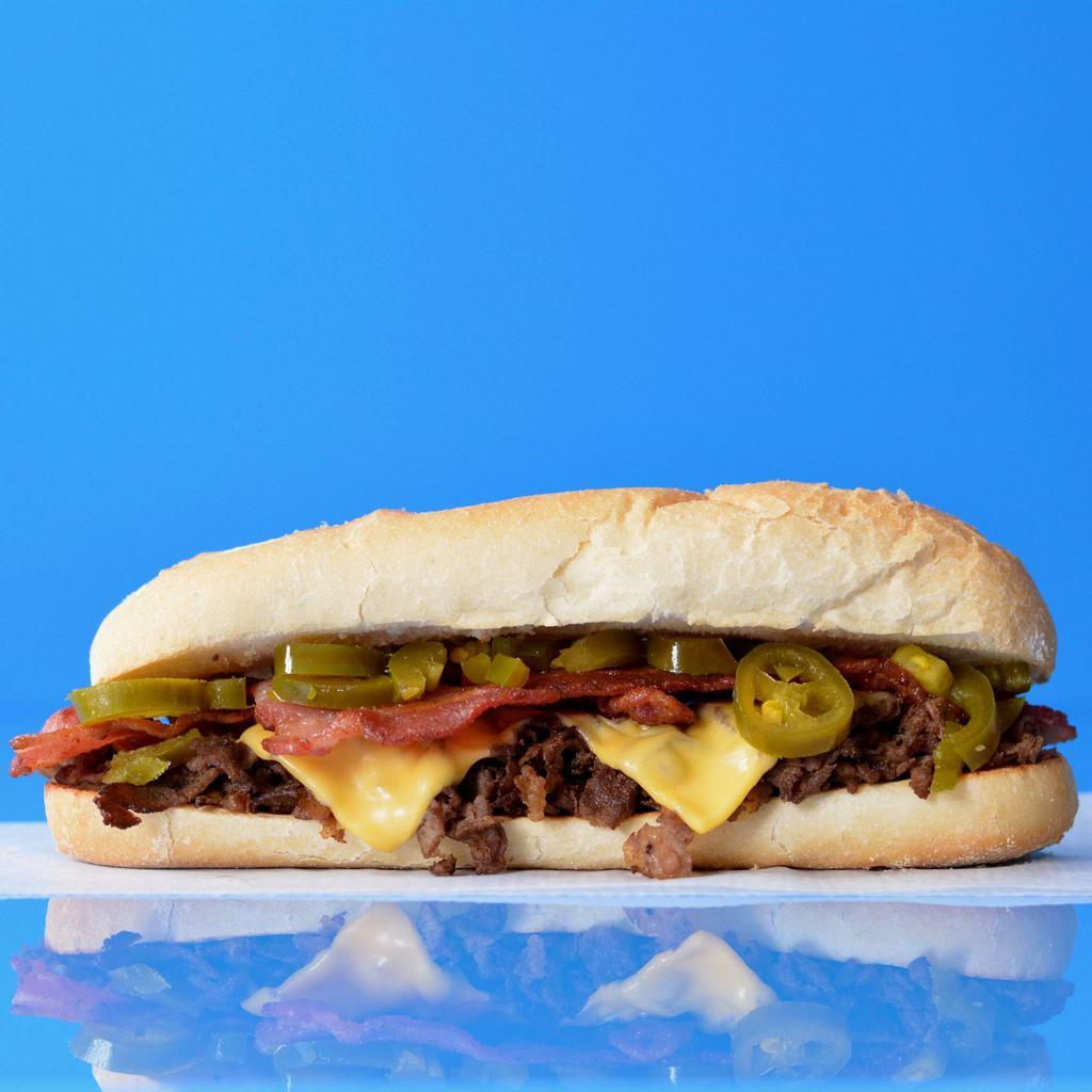 Jalapeno Bacon Cheesesteak · Classic Philly Cheesesteak loaded with steak and your choice of cheese, jalapenos and smoked bacon on a toasted Amoroso roll.