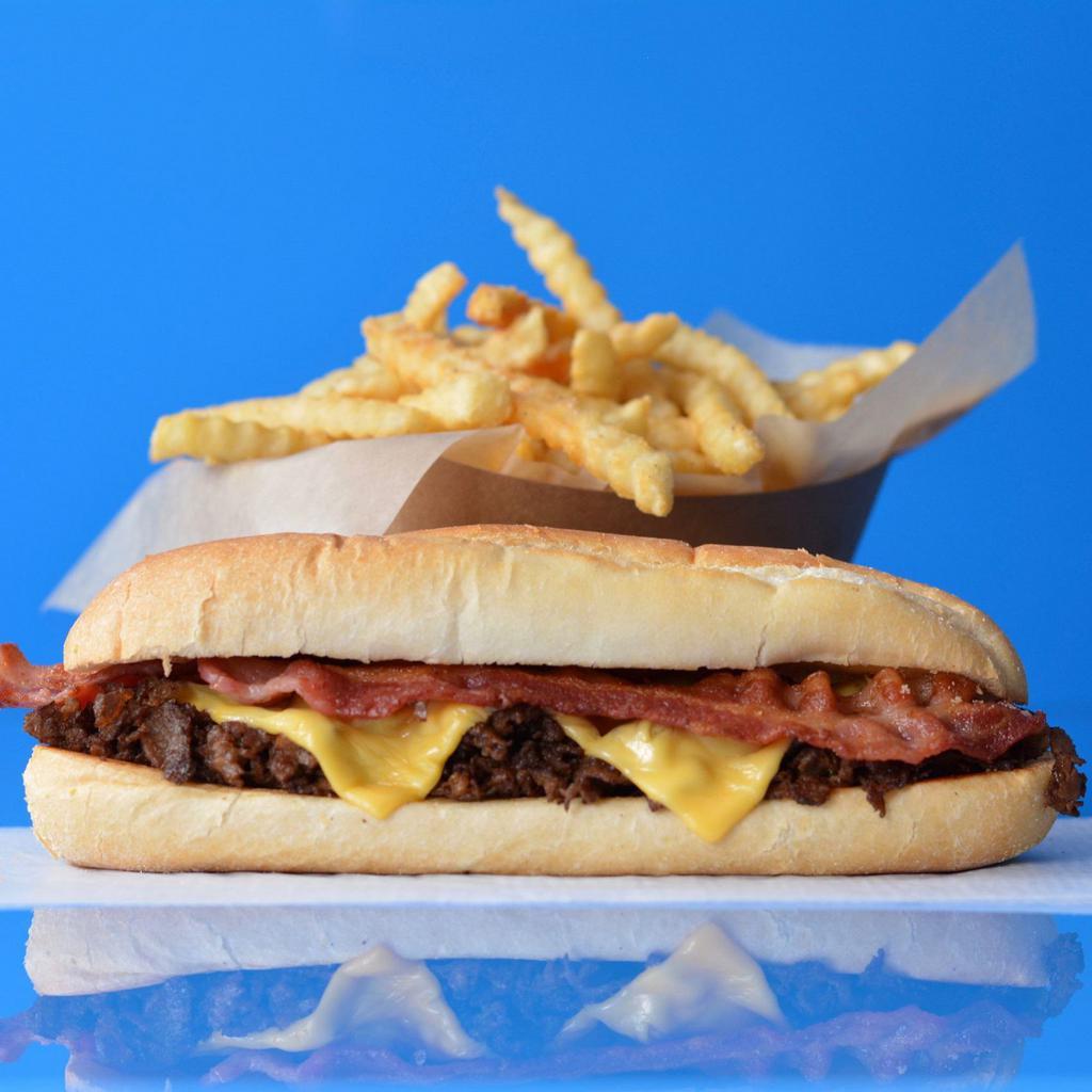 Bacon Cheesesteak Combo · Classic Philly Cheesesteak loaded with steak and your choice of cheese and smoked bacon on a toasted Amoroso roll. Served with side of fries.